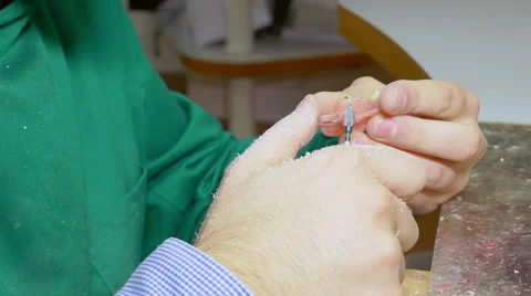 Gloved hands of an expert working with a chisel to shape a mental bridge, skill Video stock 59940116