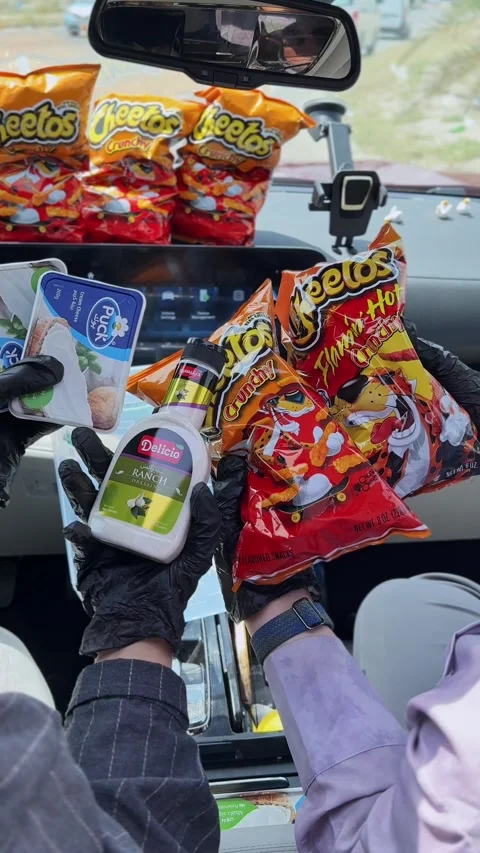 Gloved Hands Holding Cheetos And Dips In Car Stock Footage 338045818