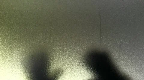 Gloved Hands Removing Moisture Covered Shimmering Glass Video stock 21375567