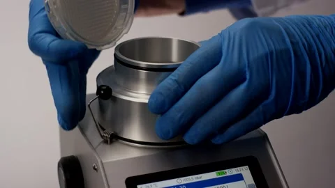 Gloved Hands Testing Filter on Laboratory Device, Clean Lab, Close Up Shot Stock Footage 341503172