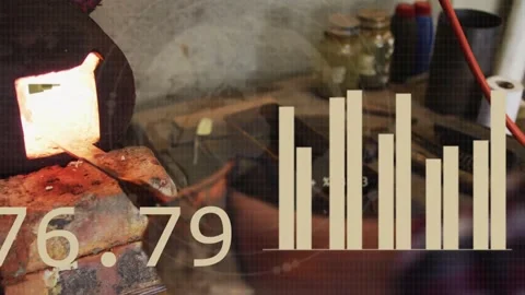 Gloved smith inserting rod into forge, pulling hot bar while HUD charts tracking Stock Footage 333818254