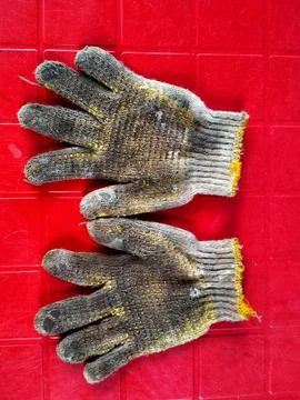 Gloves after finishing work Stock Photos