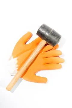 Gloves and hammer Stock Photos