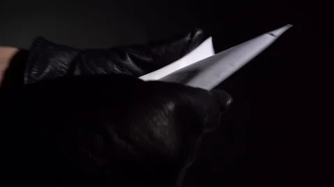 In gloves check a package with dollars 動画素材 127636643