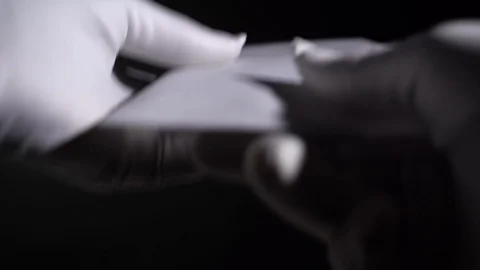 In gloves check a package with dollars Vídeo Stock 127636977