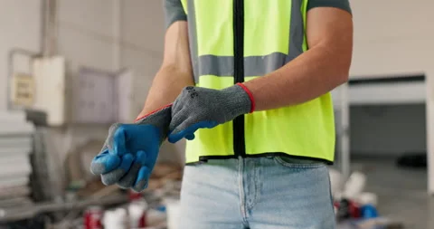 Gloves, hands and construction worker at building site with start, PPE and Stock Footage 342703657