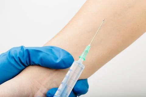 Gloves injecting medication. Foto stock