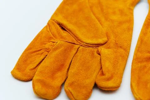 Gloves made of split leather for protection during work tasks Stock Photos
