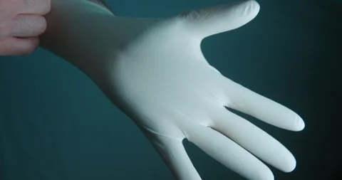 Gloves wearing man slow motion 4K Stock Footage 127928539