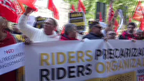 Glovo workers protest at Madrid headquarters over layoffs, Spain, ES - 16 Apr 20 Stock Footage 332836149