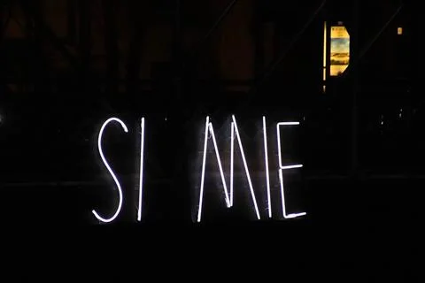 Glow in the dark the text SI MIE Stock Photos