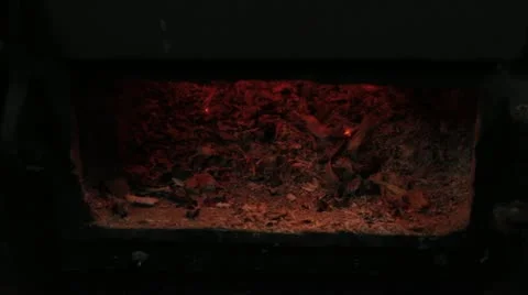 Glow of the fire in the stove Stock Footage 11895062