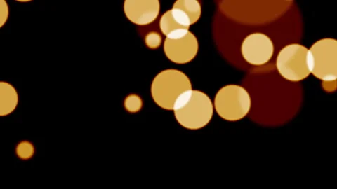 Glow orange bokeh falling on black abstract background Stock Footage 313879194