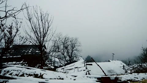 The glow upon the snow-covered roofs Jammu Kashmir Stock Footage 256563487