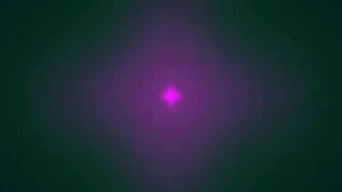 Glowing abstract light flares pulse softly in a dark cinematic background w.. Stock Footage 340944108