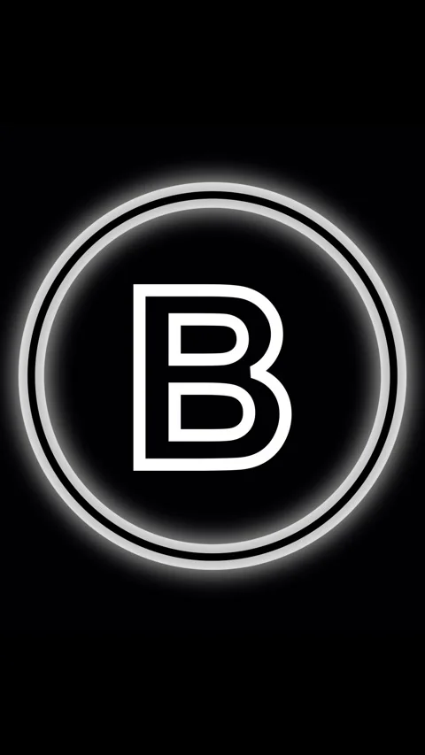 Glowing animated white letter B inside double ringed circle. Letter B alpha.. Stock Footage 344843875