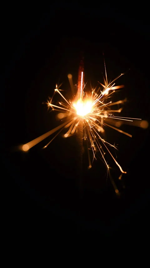 Glowing Bengal light burning in darkness vertical mobile format Stock Footage 329125898