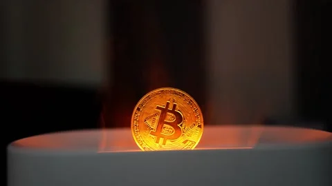 Glowing Bitcoin Coin Emerging from Container, A glowing Bitcoin coin emergi.. Stock Footage 304876569