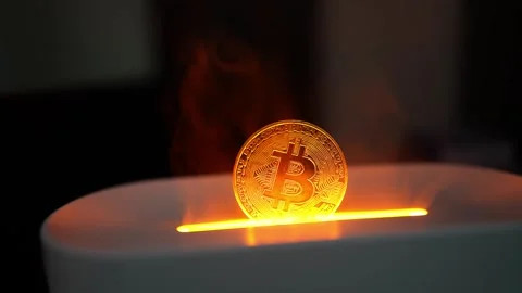Glowing Bitcoin Coin Emerging from Container, A glowing Bitcoin coin emergi.. Vídeo Stock 304876812
