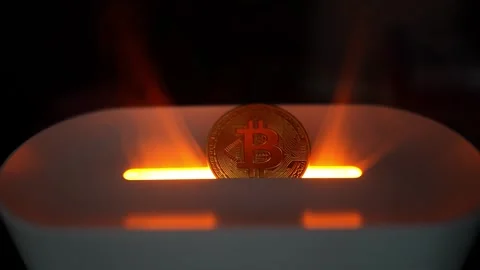 Glowing Bitcoin Coin on Smooth Surface, A glowing Bitcoin coin standing upr.. Vídeos de archivo 304876551