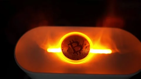 Glowing Bitcoin Coin on Surface, A glowing Bitcoin coin standing upright on.. Vidéo 304875631