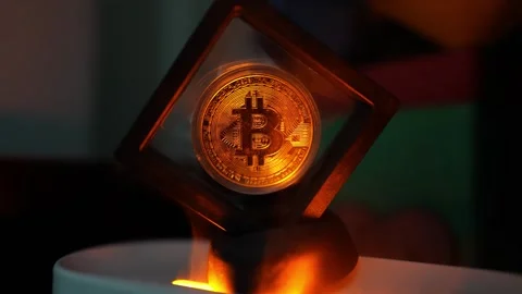 Glowing Bitcoin Symbol in Transparent Cube, A glowing Bitcoin symbol encase.. 動画素材 304876664