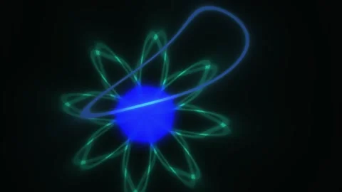 Glowing blue atom model with green electron orbits on black background. Stock Footage 336229261