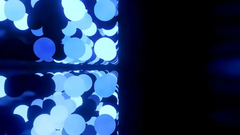 Glowing blue balls flash in shiny room. 4k abstract 3D background of luminous Stock Footage 130158470