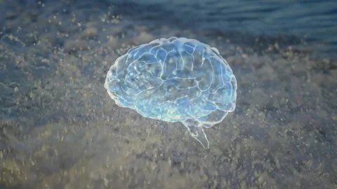 Glowing blue brain hologram hovering over surf, waves sparking rotating bobbing Stock Footage 330540527