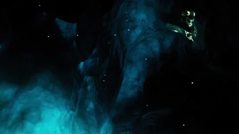 Glowing blue cave with bright spots in dark setting Stock Footage 344124843