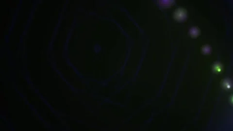 Glowing blue circle on black background with colorful dots. Stock Footage 337460659
