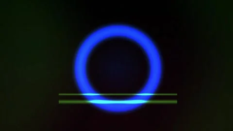 Glowing blue circle with horizontal lines on black background. Stock Footage 336229482