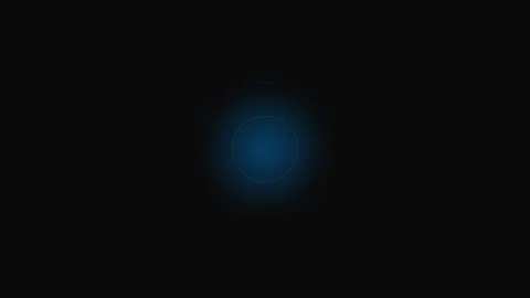 A glowing blue circular light pulsating in the center of a black background Stock Footage 339614938