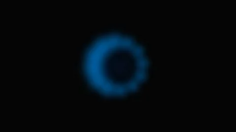 A glowing blue circular loading icon isolated against a deep black background Stock Footage 339618084
