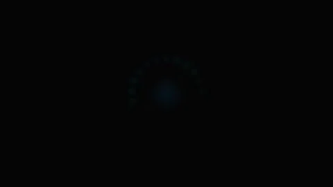 A glowing blue crescent shape emerging from a deep black background void Video stock 339616967