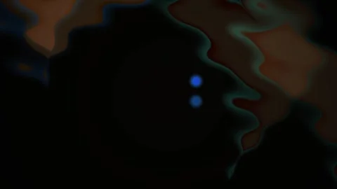 Glowing blue dots on dark background with brown shapes. Stock Footage 335514490