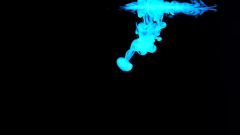 Glowing Blue Ink Drops Dissolve in Black Fluid Stock Footage 104464983
