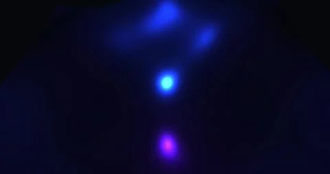 Glowing blue light streaks and fluid energy streams moving against a dark b.. Stock Footage 343507353