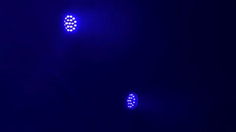 Glowing blue lights on dark background Stock Footage 337800405