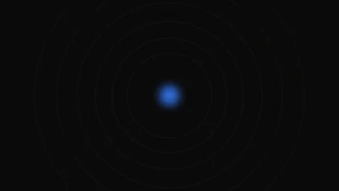 A glowing blue orb emanating concentric waves against a deep black background Stock Footage 339619333