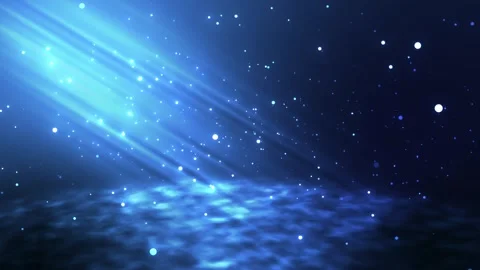 Glowing blue particles on a blue background with a ray of light at the top. Stock Footage 308106938