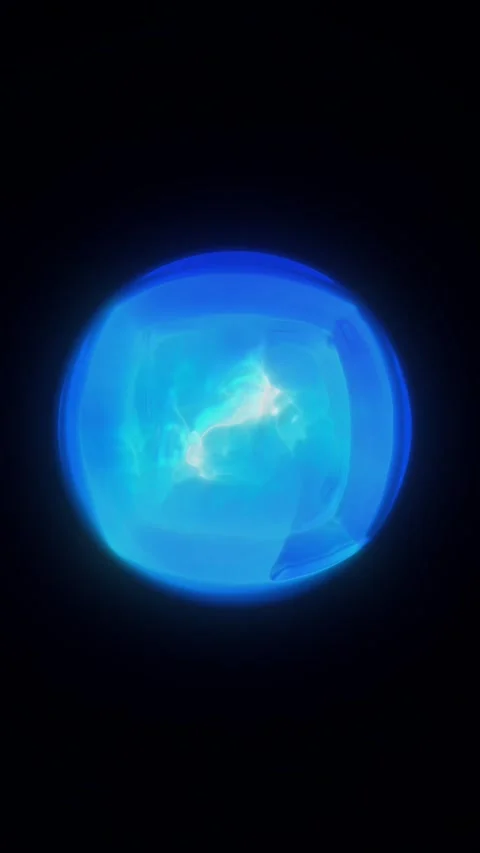 Glowing blue plasma orb on a dark background, suggesting futuristic energy,.. Stock Footage 334037054