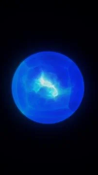 Glowing blue plasma orb on a dark background, suggesting futuristic energy,.. Stock Photos