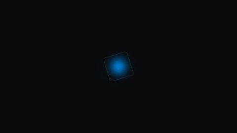A glowing blue square floating in the center of a deep black background Stock Footage 339617610