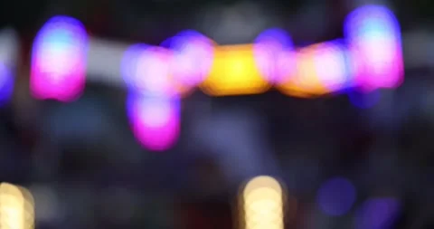 Glowing bokeh ball lights flicker in random patterns with a dark background Vídeos de archivo 155257482