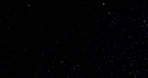 Glowing bokeh glitter particles. Elegant background. Video stock 255659208