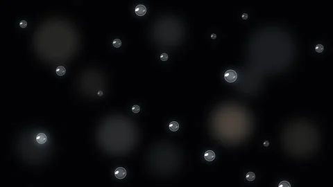 Glowing bokeh particles floating on a dark background motion graphic Stock Footage 346738386
