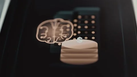 Glowing brain icon sits beside layered coins marked Stock Footage 343374400