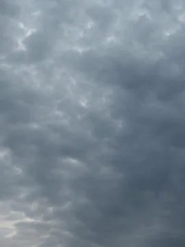 Glowing Break in Storm Clouds Stock Photos