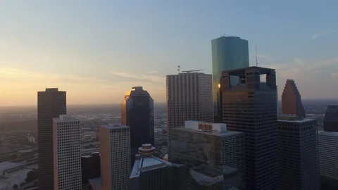 Glowing buildings from a clear summer sunset. Stock Footage 90791274